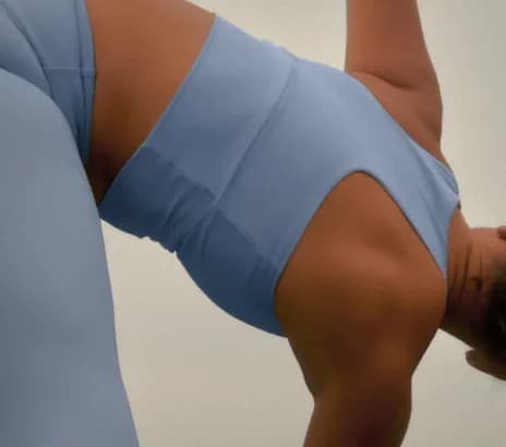 MEDVANi member smiling outdoors with her baby